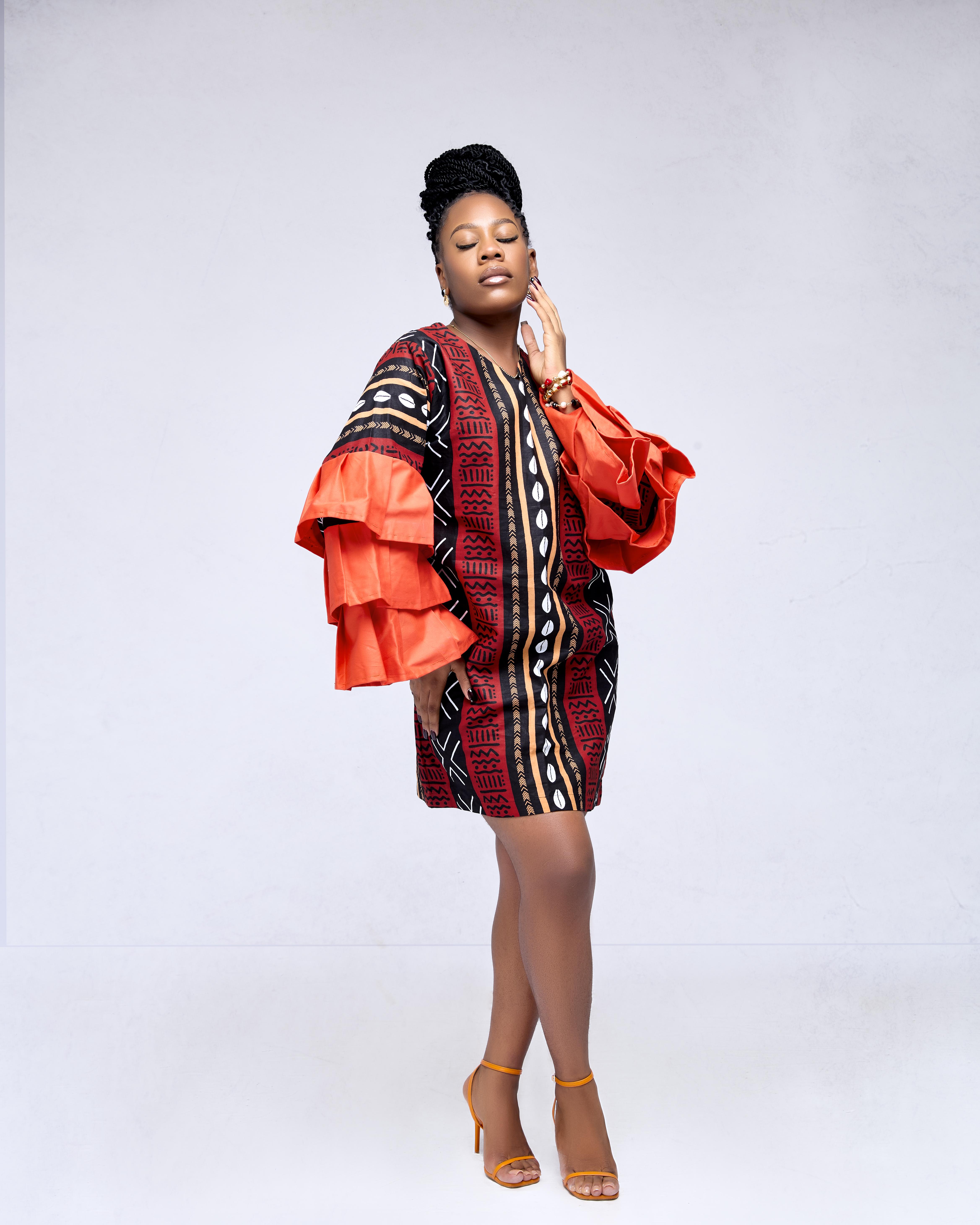 Kaelys Rise — Bogolan Mini Dress with Origami Sleeves